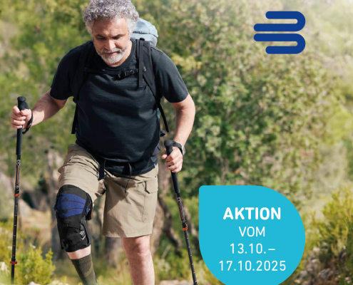 Auf dem Foto sieht man einen Mann beim Wandern, der die neue Knie-Orthese GenuTrain® OA von Bauerfeind trägt.